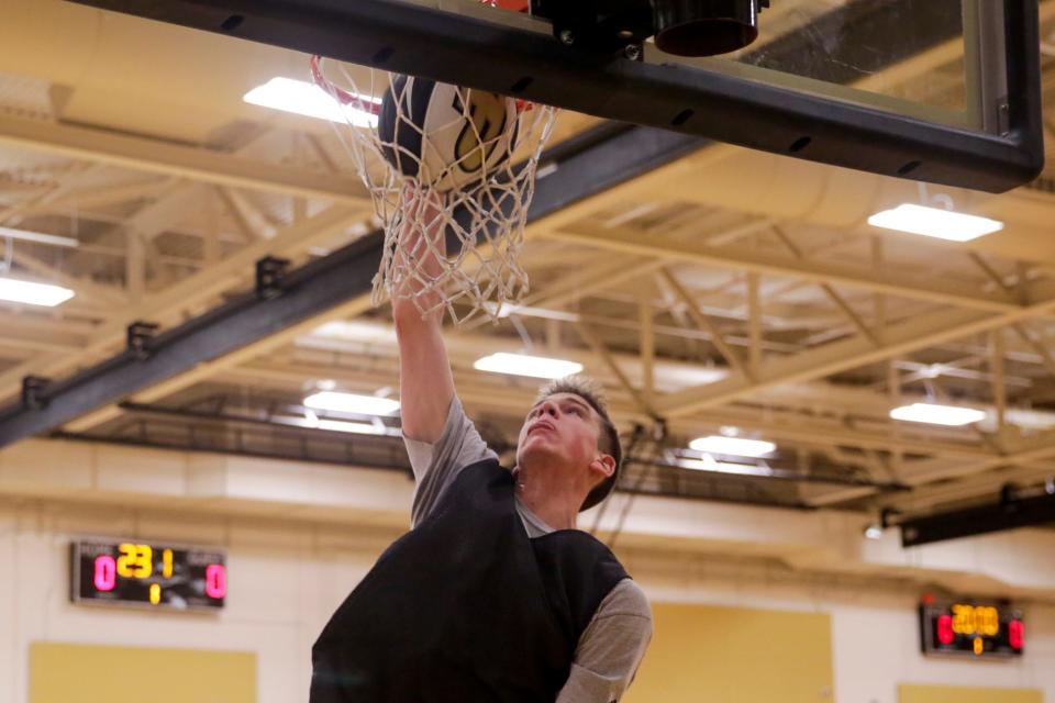 Enderlin High School’s Joe Hurlburt goes up for a dunk during a <a class="link " href="https://sports.yahoo.com/ncaaw/teams/purdue/" data-i13n="sec:content-canvas;subsec:anchor_text;elm:context_link" data-ylk="slk:Purdue;sec:content-canvas;subsec:anchor_text;elm:context_link;itc:0">Purdue</a> Men’s Basketball Elite Camp, Saturday, Aug. 24, 2019 at the Cordova Recreational Sports Center in West Lafayette.<br>Purdue Men S Elite Basketball Camp