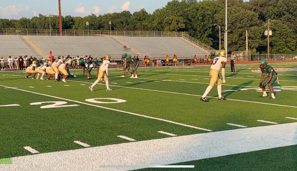 Radarious Jackson (3) lines up at wide receiver against against White Station on Thursday, Aug. 15 at Halle Stadium.