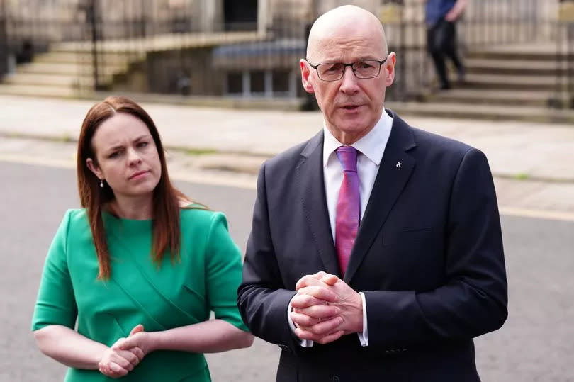 Kate Forbes and newly appointed First Minister of Scotland John Swinney speak to the media outside Bute House, Edinburgh, after he appointed her as Deputy First Minister