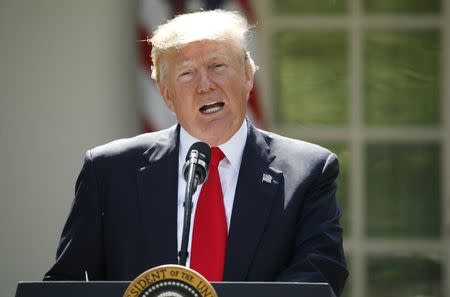 U.S. President Donald Trump announces his decision that the United States will withdraw from the landmark Paris Climate Agreement, in the Rose Garden of the White House in Washington, U.S., June 1, 2017. REUTERS/Kevin Lamarque