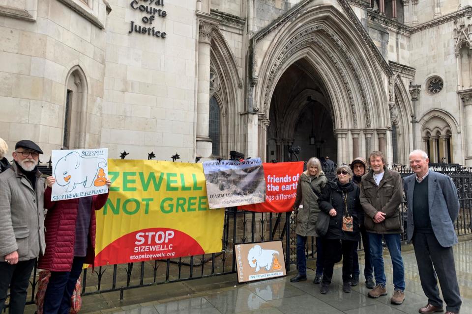 Members of Together Against Sizewell C outside the Royal Courts of Justice in London (PA Archive)