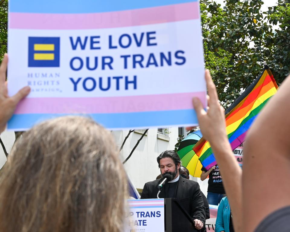 Protesters rally against anti-transgender legislation on March 30, 2021, in Montgomery, Alabama.