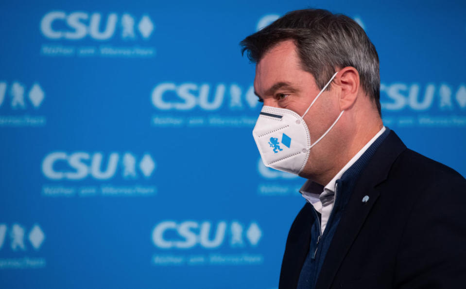 09 November 2020, Bavaria, Munich: Markus SÃ¶der (CSU), party chairman and Minister President of Bavaria, is wearing a KN95 mouth-and-nose protector with the CSU symbols lion and rhombus at the party headquarters before his press statement before the start of the CSU executive committee meeting. Photo: Sven Hoppe/dpa (Photo by Sven Hoppe/picture alliance via Getty Images)