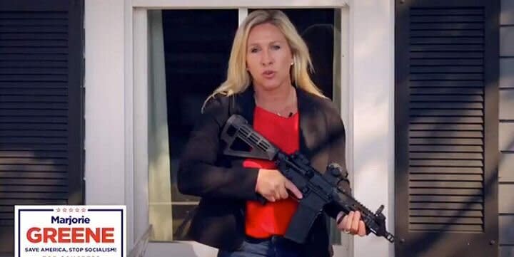 Republican congressional candidate and QAnon conspiracy cultist Marjorie Taylor Greene brandishes an AR-15 assault rifle while defending property against antifa activists who never appeared. (Photo: YouTube)