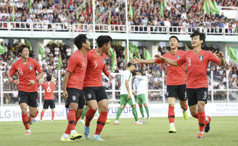 South Korea's team players celebrate after scoring a goal during the World Cup Group H qualifying soccer match between Turkmenistan and South Korea at the Kopetdag Stadium in Ashgabat, Turkmenistan, Tuesday, Sept. 10, 2019. (AP Photo/Alexander Vershinin)