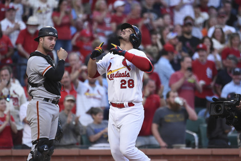 St. Louis Cardinals' Nolan Arenado (28) reacts after hitting a two run home run during the fourth inning of a baseball game against the San Francisco Giants on Sunday, May 15, 2022, in St. Louis. (AP Photo/Joe Puetz)