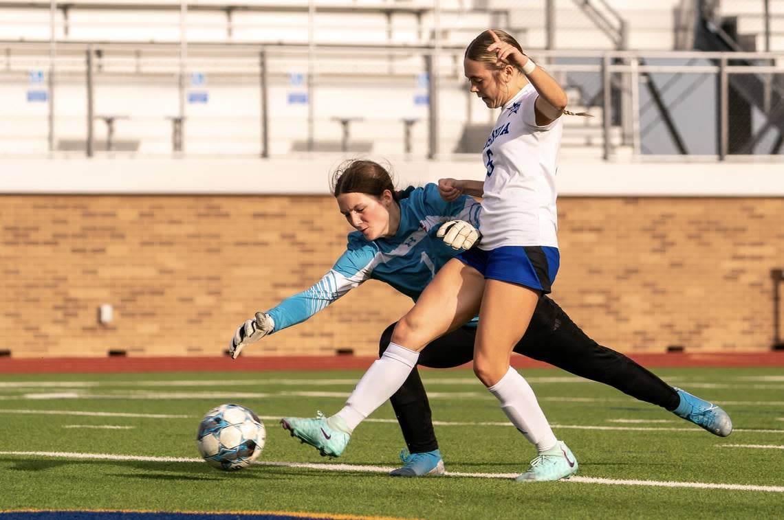 Joshua’ Hannah Day (6), right, scores after a misplayed ball by Justin Northwest goalkeeper Addison Roddam (1) in a Class 5A area-round girls soccer match on Friday, March 29, 2024 at Boswell High School in Fort Worth ,Texas. Joshua defeated Northwest 4-1. Oscar Perez/O&D Sports Photography