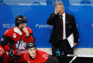 Ice Hockey - Pyeongchang 2018 Winter Olympics - Men Semifinal Match - Canada v Germany - Gangneung Hockey Centre, Gangneung, South Korea - February 23, 2018 - Canada's head coach Willie Desjardins reacts. REUTERS/Grigory Dukor