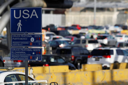 A sign marking the pedestiran crossing lane is seen at the San Ysidro point of entry, in Tijuana, Mexico April 1, 2019. REUTERS/Jorge Duenes