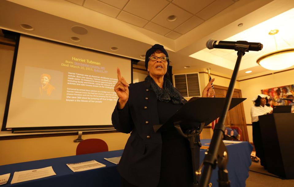 Leona Martin portrays Harriet Tubman during the Brockton Area Branch NAACP's homage to influential Black leaders at the library on Saturday, Feb. 4, 2023.