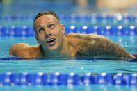 Caeleb Dressel after winning the men's 100 butterfly during wave 2 of the U.S. Olympic Swim Trials on Friday, June 18, 2021, in Omaha, Neb. (AP Photo/Jeff Roberson)