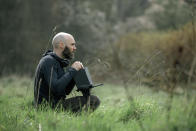 This image released by A24 shows director David Lowery on the set of "The Green Knight." (Eric Zachanowich/A24 via AP)