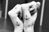 <div class="caption-credit"> Photo by: bohobride.co.uk</div><div class="caption-title">Anchors Away</div>The nautical anchor represents steadiness in rough seas, right? These small tattoos say a lot then.