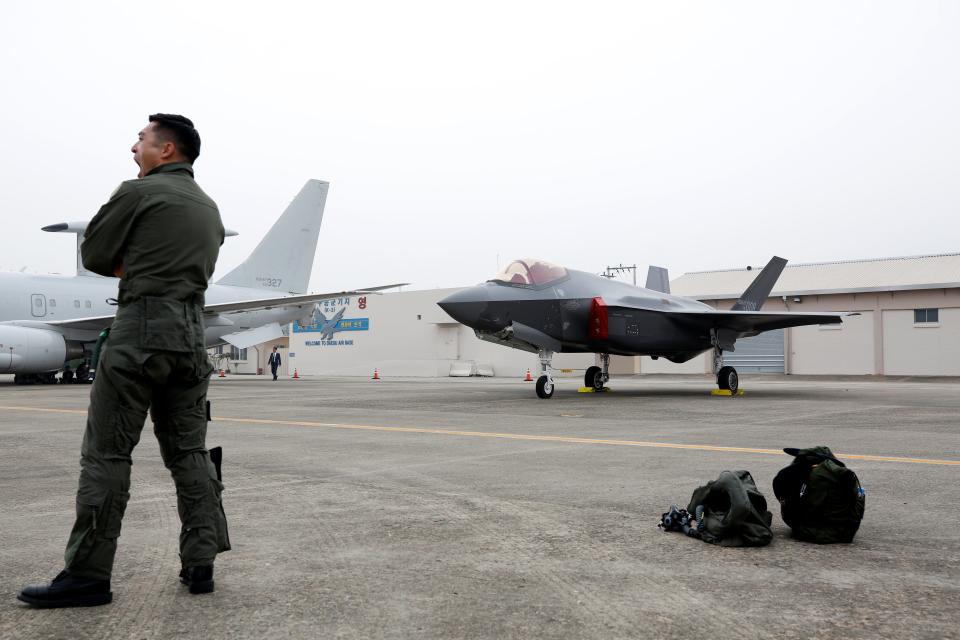 South Korean fighter pilot stands next to his F-35 stealth fighter during a ceremony to mark the 71st Armed Forces Day at the Air Force Base in Daegu, South Korea, October 1, 2019