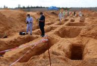 Libyan investigators find more mass graves in recaptured city