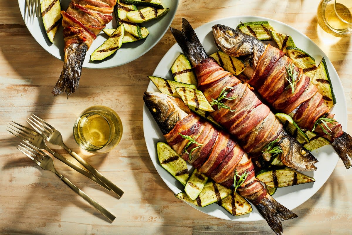 If you have trepidation about grilling whole fish, try this bacon-wrapped trout recipe (Ann Maloney/The Washington Post)