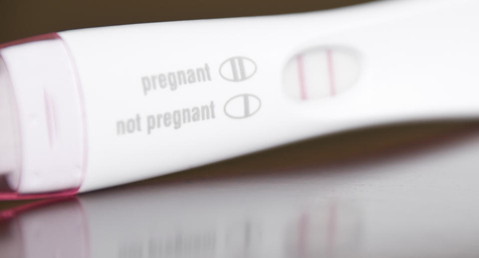 A positive pregnancy test.