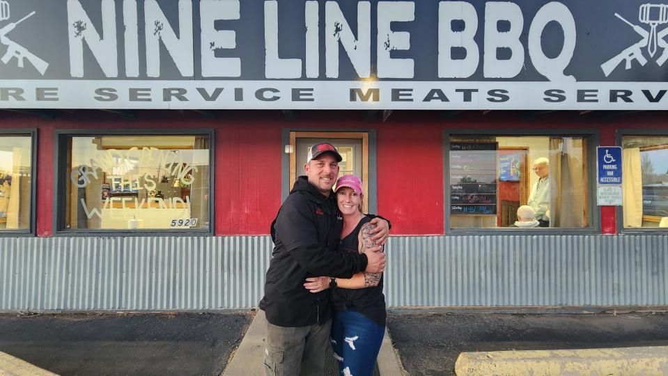 John and Anastasia Blanda stand in front of their newly opened restaurant Nine Line BBQ on Hillside Road in Amarillo.