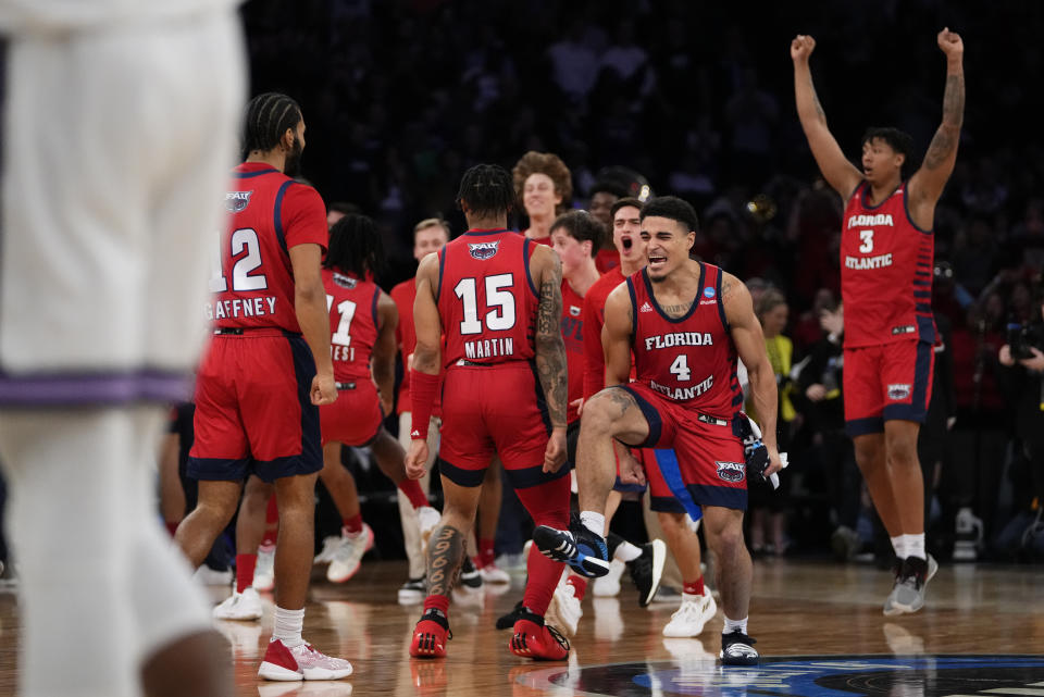 Florida Atlantic players celebrate after defeating Kansas State in an Elite 8 college basketball game in the NCAA Tournament's East Region final, Saturday, March 25, 2023, in New York. (AP Photo/Frank Franklin II)