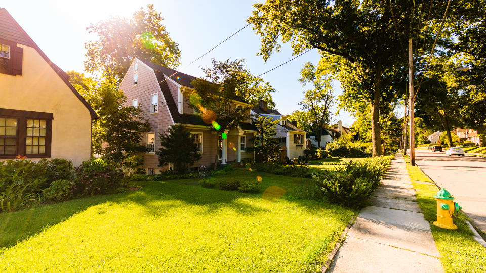 Residential street and living houses in New Rochelle, Westchester, at beautiful sunny day.