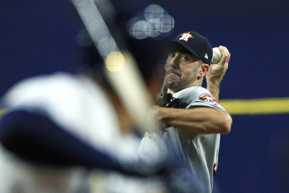 Houston Astros' Justin Verlander pitches against the Tampa Bay Rays in the first inning of Game 4 of a baseball American League Division Series, Tuesday, Oct. 8, 2019, in St. Petersburg, Fla. (AP Photo/Mike Erhmann, Pool)