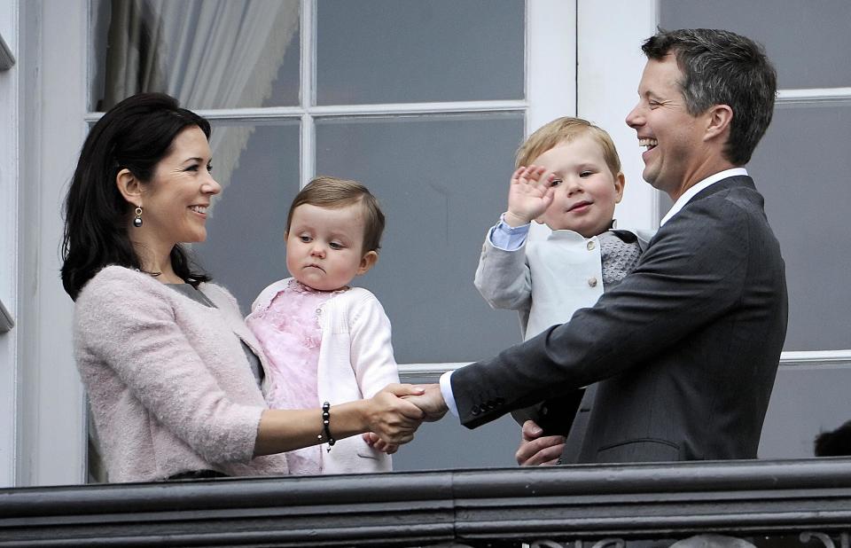 <p>Children Prince Christian and Princess Isabella are pictured on the balcony at Amalienborg Palace in May 2008 to celebrate the Crown Prince's 40th birthday.</p>