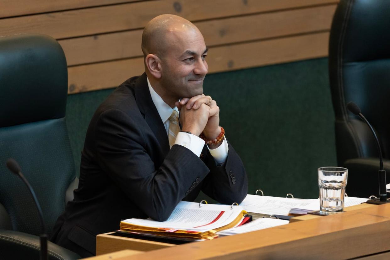 Yukon Premier Ranj Pillai in the legislative assembly in March 2023. Pillai said disagreements between policy analysts are a normal part of government. (Crystal Schick/The Canadian Press - image credit)