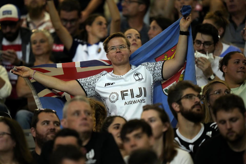 A Fiji's fan waits for the start of the Rugby World Cup Pool C match between Fiji and Portugal, at the Stadium de Toulouse in Toulouse, France, Sunday, Oct. 8, 2023. (AP Photo/Pavel Golovkin)