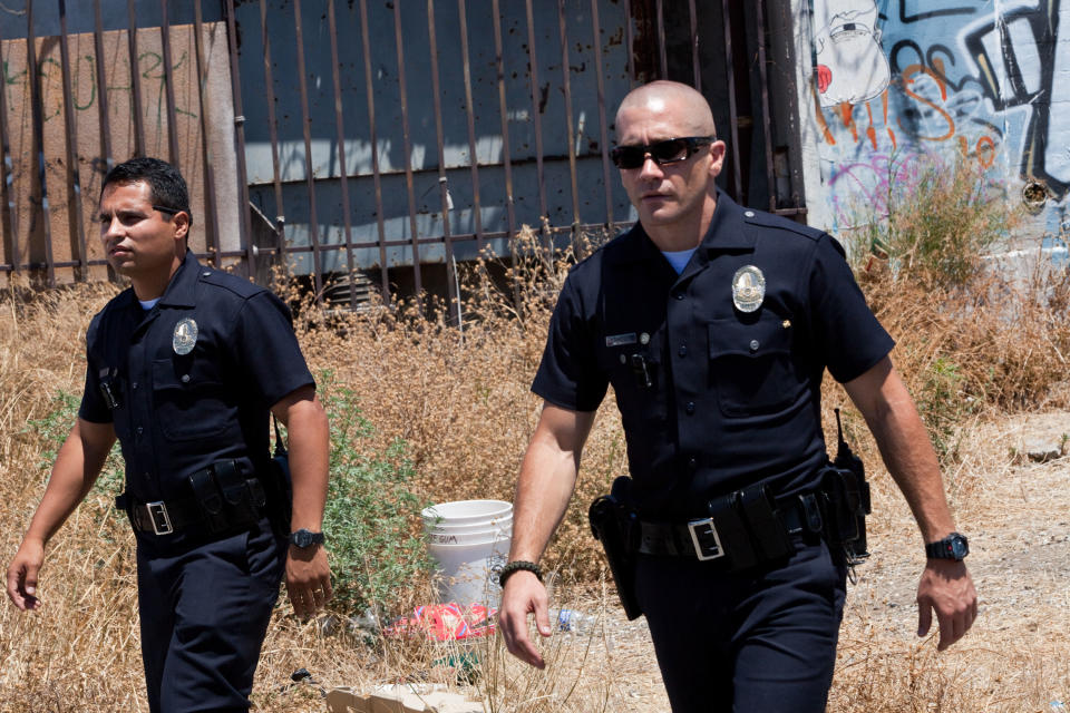 This film image released by Open Road Films shows Michael Pena, left, and Jake Gyllenhaal in a scene from "End of Watch." (AP Photo/Open Road Films, Scott Garfield)