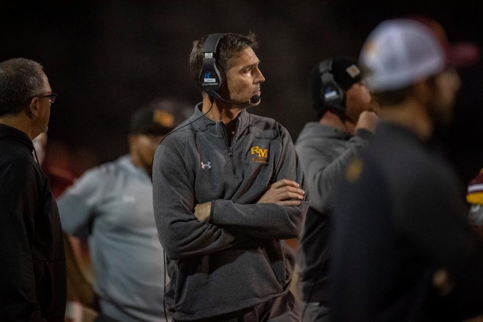 Rocky Mountain head coach Mark Brook watches his team take on Fossil Ridge at French Field on Friday, Oct. 22, 2021.