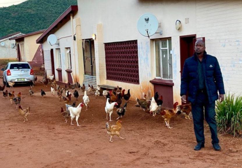 Nurse Menzi Nkomo is seen outside the   Nkwene Clinic where he works - and has been living to avoid infecting his family with COVID-19 - in the tiny African kingdom of Eswatini. / Credit: CBS/Debora Patta