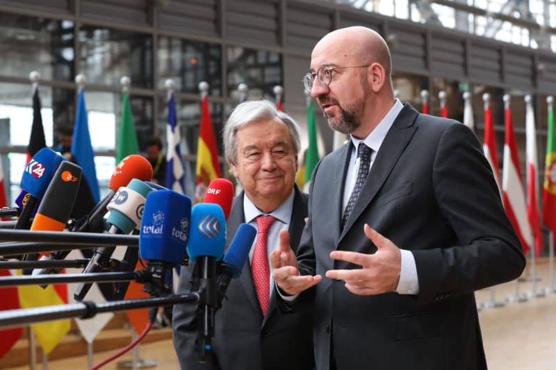 United Nations Secretary General Antonio Guterres and President of the European Council Charles Michel, speak to media as they arrive to attend a round table meeting at the EU summit in Brussels. -/European Council/dpa