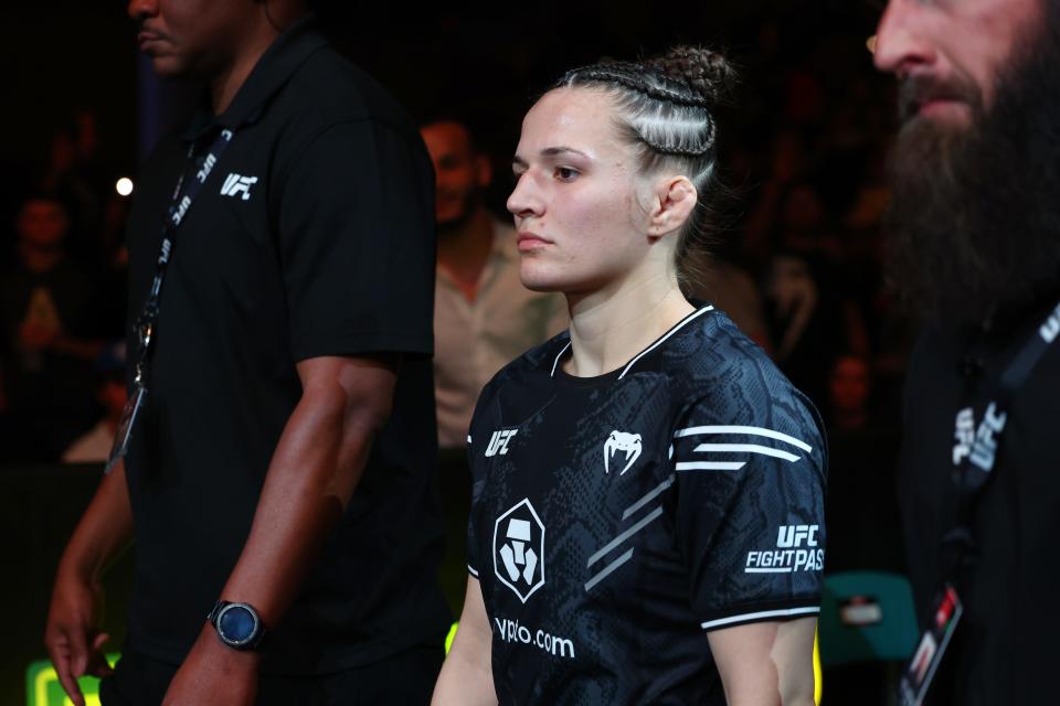 Mar 30, 2024; Atlantic City, New Jersey, USA; Erin Blanchfield (red gloves) walks to the Octagon to fight Manon Fiorot (not pictured) during UFC Fight Night at Boardwalk Hall. Mandatory Credit: Ed Mulholland-USA TODAY Sports