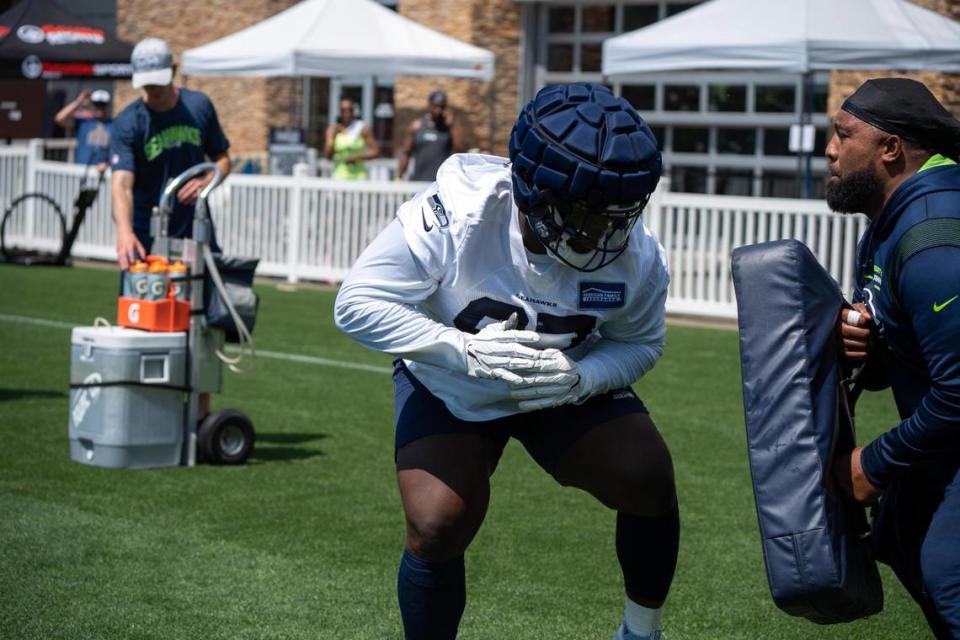 Seattle Seahawks left defensive tackle Poona Ford works on his defensive drills during the first day of training camp at the Virginia Mason Athletic Center on July 27, 2022.