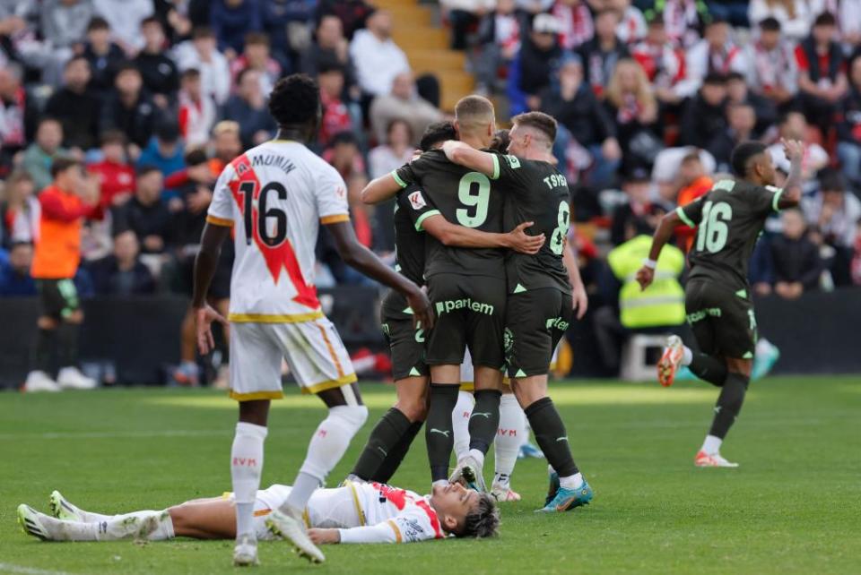 Savio (right) celebrates scoring his team’s second goal