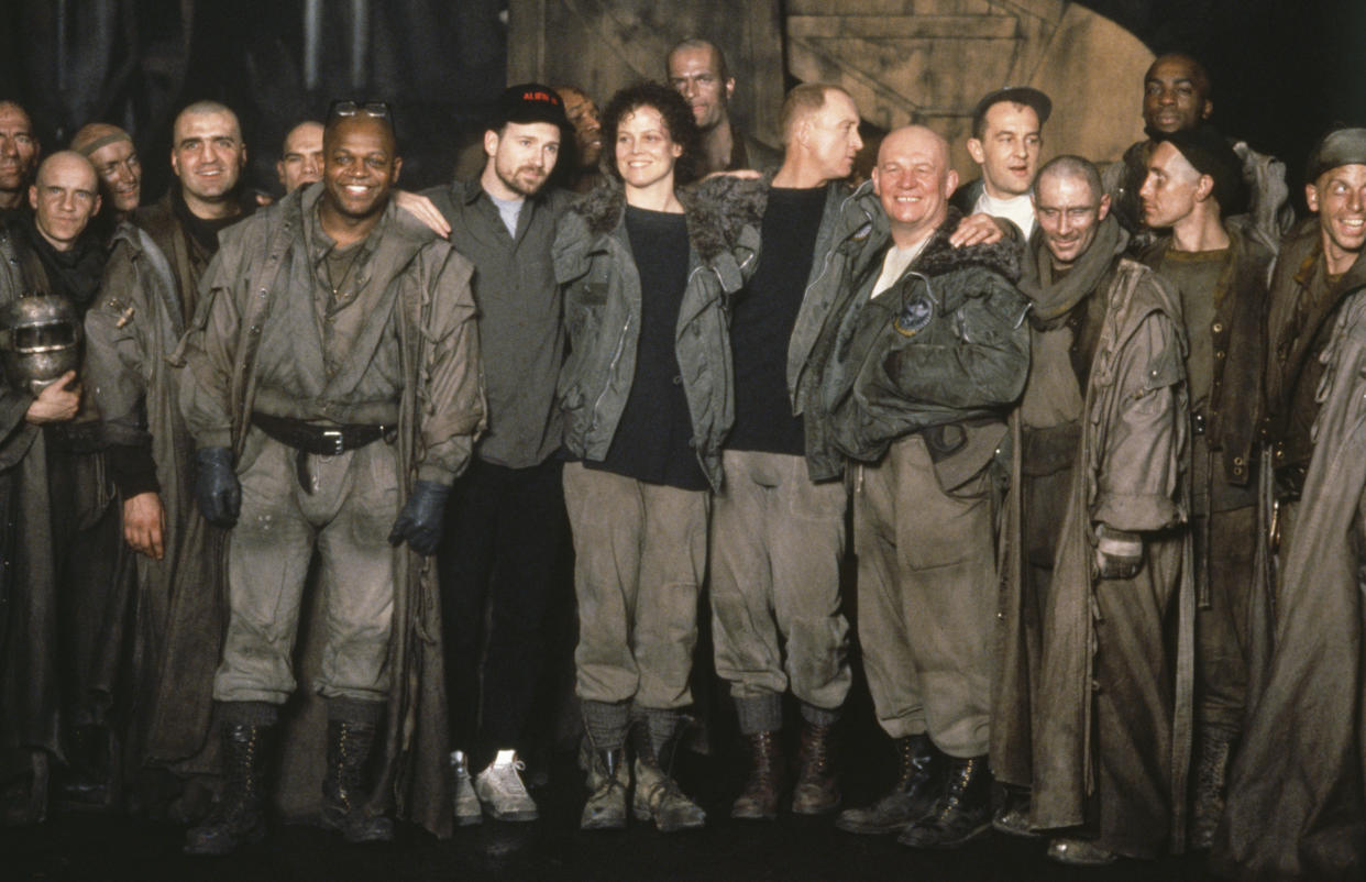 American actress Sigourney Weaver surrounded by all the cast of the movie Alien 3, directed by David Fincher. (Photo by Rolf Konow/Sygma/Sygma via Getty Images)