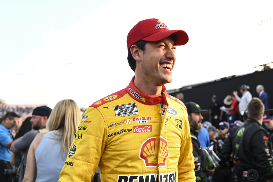 Joey Logano smiles prior to the NASCAR All-Star Cup Series auto race at North Wilkesboro Speedway, Sunday, May 21, 2023, in North Wilkesboro, N.C. (AP Photo/Matt Kelley)