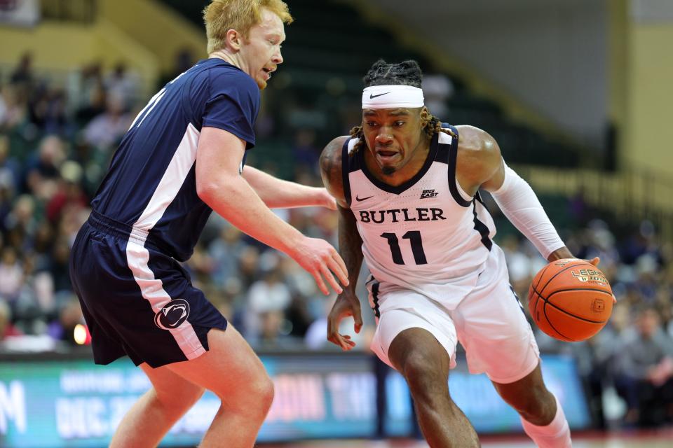 aNov 24, 2023; Kissimmee, FL, USA; Butler Bulldogs guard Jahmyl Telfort (11) drives to the hoop against the Penn State Nittany Lions in the second half during the ESPN Events Invitational Consolation game 1 at State Farm Field House.