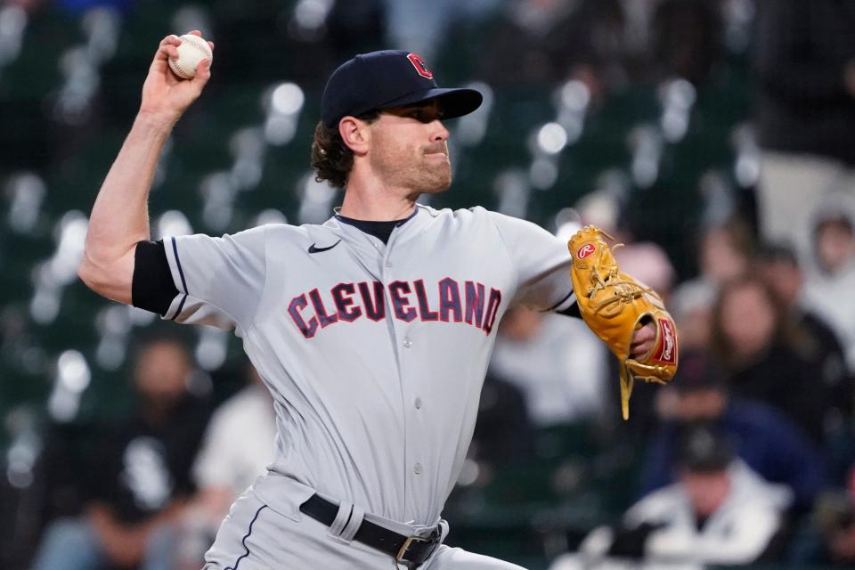 Cleveland Guardians starting pitcher Shane Bieber throws to a Chicago White Sox batter during the first inning of a baseball game Thursday, Sept. 22, 2022, in Chicago. (AP Photo/David Banks)