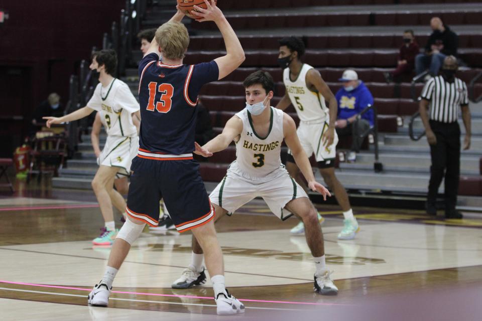 Briarcliff's Evan Van Camp tries to make a pass, as Hastings' Robert Kennedy matches up with him defensively during a Slam Dunk Showcase game at Iona College on Sunday, Jan. 9, 2022.