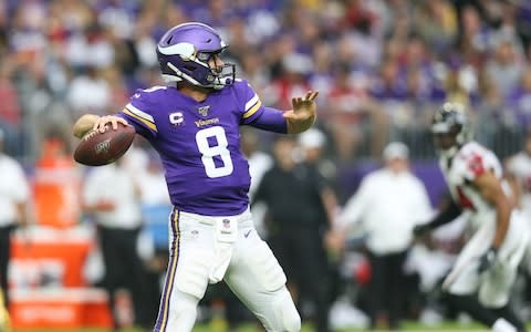 Minnesota Vikings quarterback Kirk Cousins (8) throws a pass against the Atlanta Falcons during the third quarter at U.S. Bank Stadium - Credit: USA Today