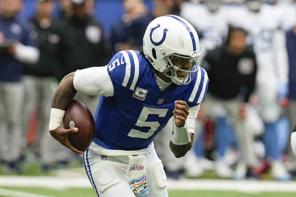 Indianapolis Colts quarterback Anthony Richardson (5) runs the ball against the Tennessee Titans during the first half of an NFL football game, Sunday, Oct. 8, 2023, in Indianapolis. (AP Photo/Darron Cummings)