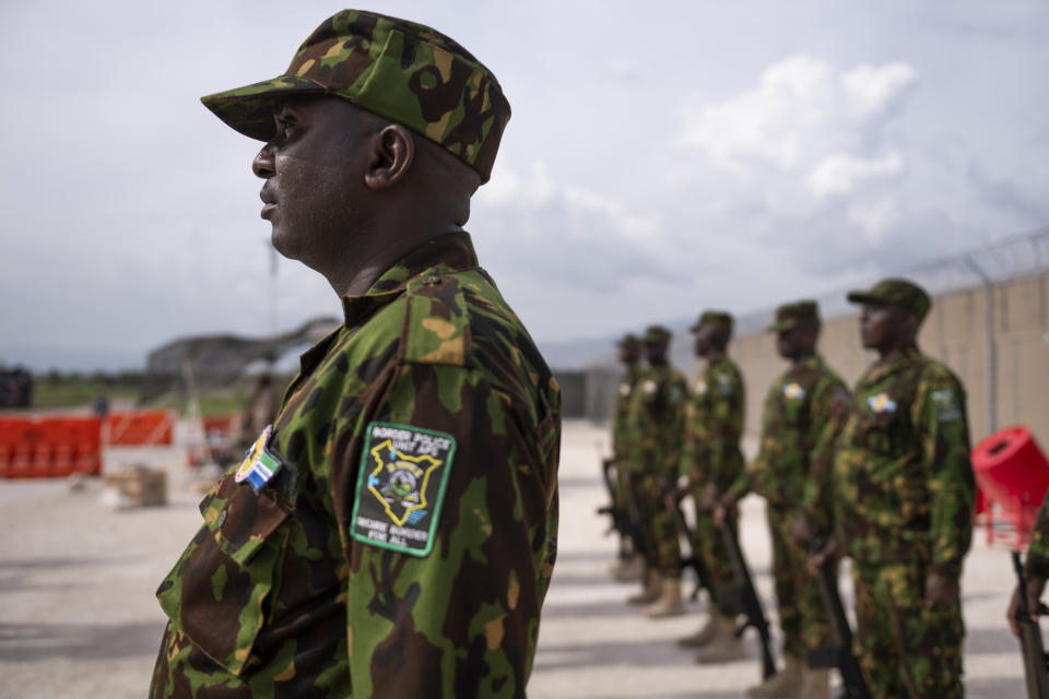 Kenyan members of the Multinational Security Support Mission (MSS) stand at attention as they await the arrival of U.S. Secretary of State Antony Blinken in Port-au-Prince, Haiti, Thursday, Sept. 5, 2024. (Roberto Schmidt/Pool photo via AP)