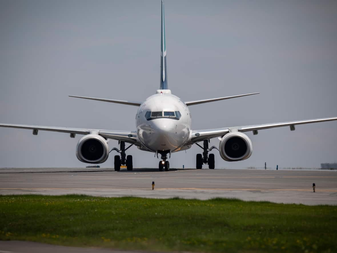 WestJet says the customer data issue that happened Wednesday arose because of an internal technology change. (Evan Mitsui/CBC - image credit)