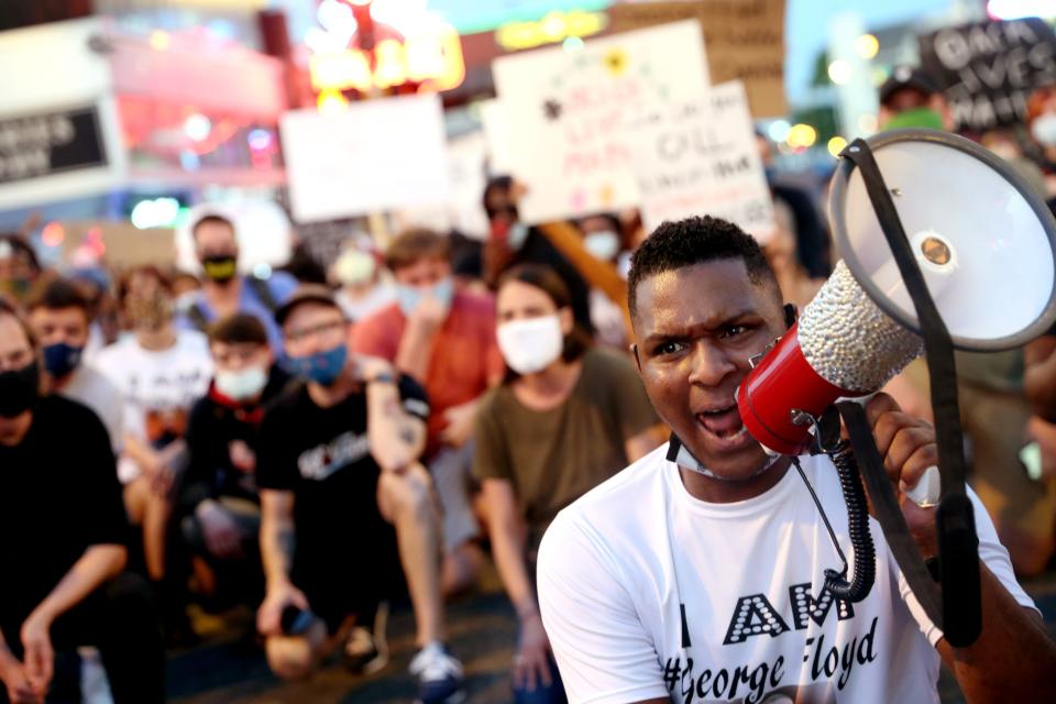 Devante Hill leads a march May 29 from FedExForum to the National Civil Rights Museum in Memphis, Tenn., in reaction to the death of George Floyd.