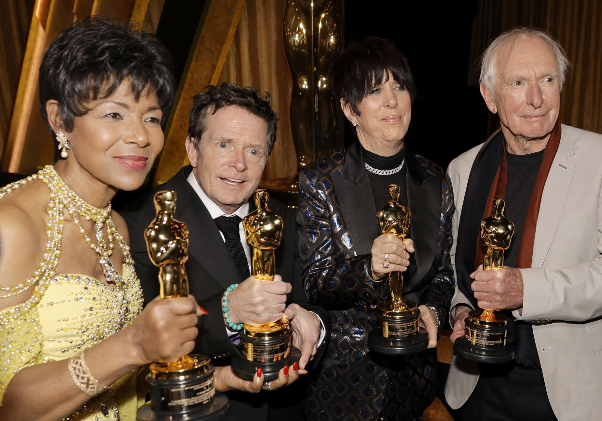 LOS ANGELES, CALIFORNIA - NOVEMBER 19: (L-R) Euzhan Palcy, Michael J. Fox, Diane Warren, and Peter Weir pose with their awards during the Academy of Motion Picture Arts and Sciences 13th Governors Awards at Fairmont Century Plaza on November 19, 2022 in Los Angeles, California. (Photo by Kevin Winter/Getty Images)