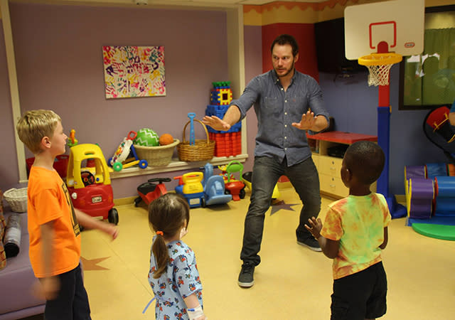 Chris Pratt continues to be one of the most loveable movie stars ever. After zookeepers everywhere shared their own hilarious parodies of Pratt's famous pose training his velociraptors in <em>Jurassic World</em>, the 36-year-old actor himself recreated the scene with a few adorable youngsters at a children's hospital he visited on Sunday. Reddit user chrysias posted this adorable snapshot. "Chris Pratt brought his velociraptor training skills to my local children's hospital today," the picture reads. Reddit <strong>WATCH: Chris Pratt & Anna Faris On How They Maintain Their Happy Marriage</strong> This of course isn't the first time Pratt has showed up in character during his undercover visits to children's hospitals. Last July, he admitted to stealing his <em>Guardians of the Galaxy</em> costume for that sole purpose. "I stole the jacket and some of the wardrobe so that, if this movie comes out and does what everyone hopes it can, I can follow the example of someone -- say, like, a [Seattle Seahawks quarterback] Russell Wilson -- and go visit kids," he told Panzer TV. "If it was a big enough movie to where it would mean something to a kid who's sick in the hospital for Peter Quill or Star-Lord to come visit them, I’ll do that. I think that's awesome, man. That would give me real meaning for this movie, you know?" Pratt has obviously followed through, such as when he donned his Star-Lord getup to visit children in Boston area hospitals in February, after losing a Superbowl bet to <em>Avengers </em>star Chris Evans. HUGE thank you to @prattprattpratt & @ChrisEvans for visiting the kids here at #chrishaven! #MARVELous #TeamEvans pic.twitter.com/hwmLwezF5A— Christopher's Haven (@chris_haven) February 6, 2015 <strong>NEWS: Chris Pratt Opens Up About Losing His Dad During 'Jurassic World' -- 'I Got Pretty Angry'</strong> Watch the video below for more of Pratt and Evans' heartwarming children's hospital visits.