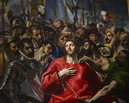 The three-metre high painting "El Expolio", or "The Disrobing of Christ", by Spanish Renaissance painter El Greco, is seen in the the sacristy of the Cathedral of Toledo during a ceremony marking its return following restoration January 22, 2014. REUTERS/Paul Hanna