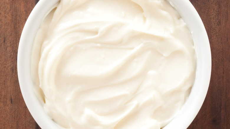 Cream cheese in white bowl