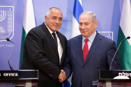 Israeli Prime Minister Benjamin Netanyahu shakes hands with Bulgarian Prime Minister Boyko Borissov during a meeting at the prime minister's office in Jerusalem, June 13, 2018. Abir Sultan/Pool via Reuters